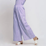 Left View of a Model wearing Lavender Hand Tie Dye Cotton Elasticated Wide Legged Pant