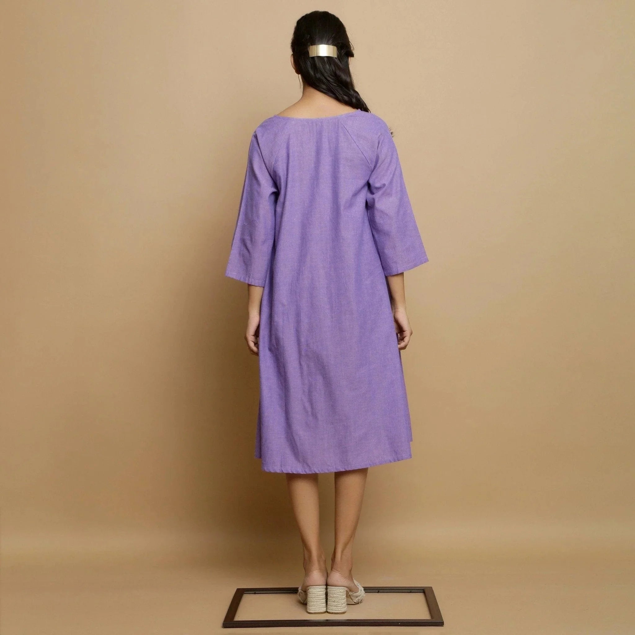 Back View of a Model wearing Lavender Hand-Embroidered Godet Dress