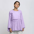 Front View of a Model wearing Lavender Tie Dyed Anti-Fit Outerwear