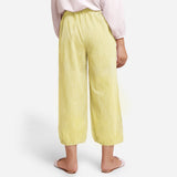 Back View of a Model wearing Lemon Yellow Yarn Dyed Cotton Harem Pant
