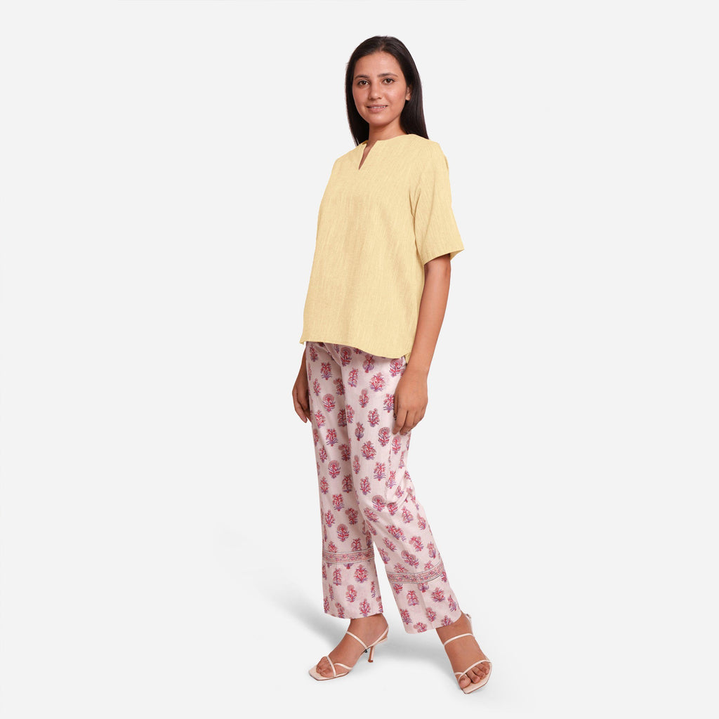 Left View of a Model wearing Lemon Yellow Yarn Dyed Cotton High-Low Top