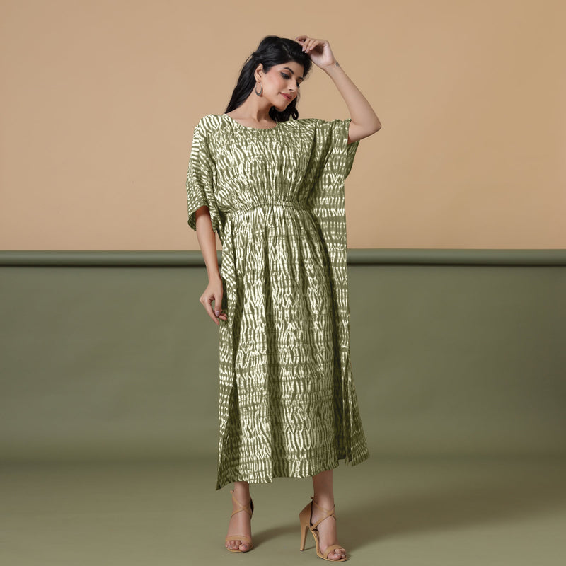 Right View of a Model wearing Light Green Shibori Kaftan Dress