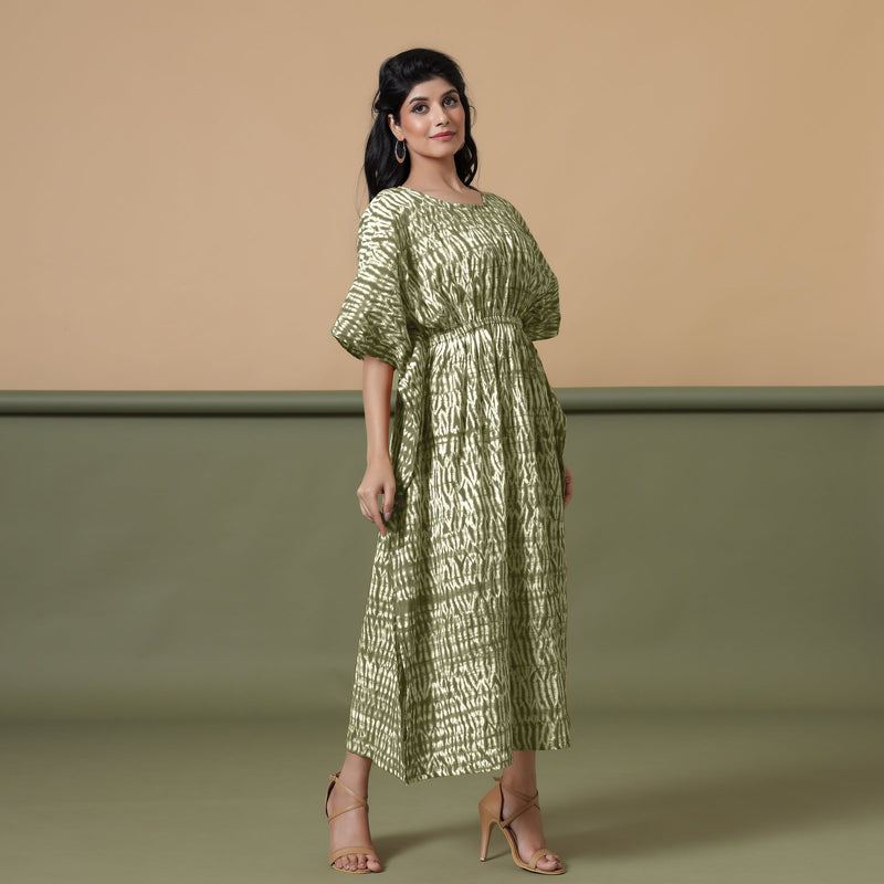 Right View of a Model wearing Light Green Shibori Kaftan Dress