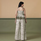 Back View of a Model wearing Light Green Shibori Tier Camisole Top