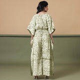 Back View of a Model wearing Light Green Shibori V-Neck Cotton Kaftan Jumpsuit