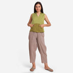 Front View of a Model wearing Light Green Cotton Flax Kangaroo Pocket Hoodie Top