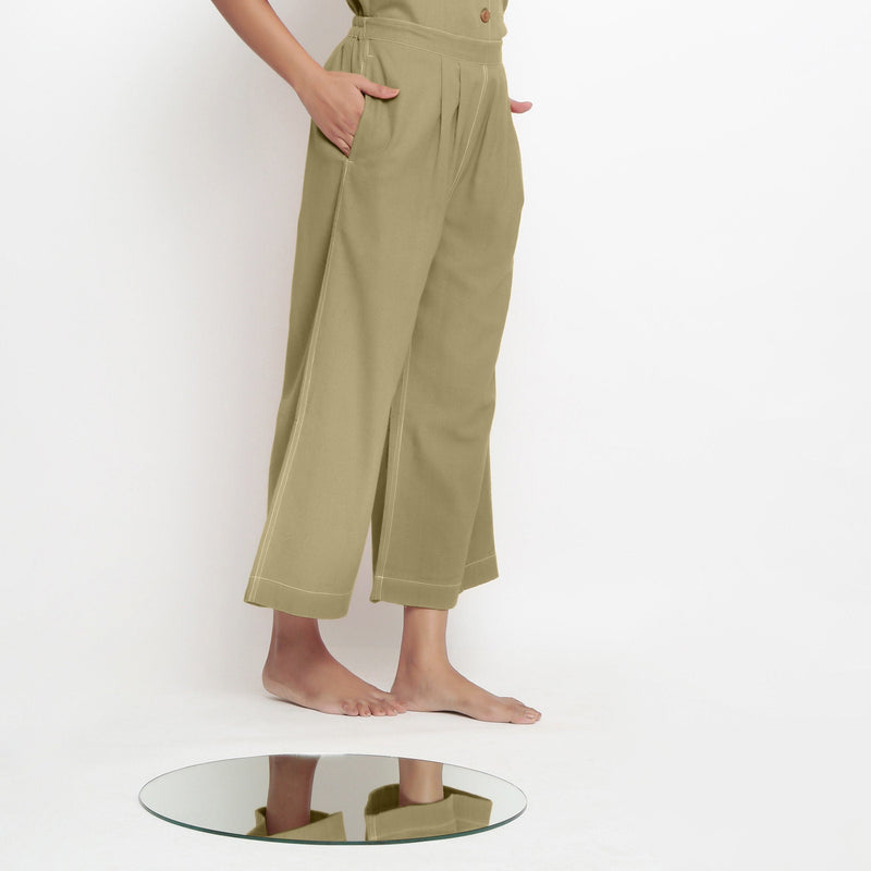 Right View of a Model wearing Light Green Vegetable Dyed Wide Legged Pant