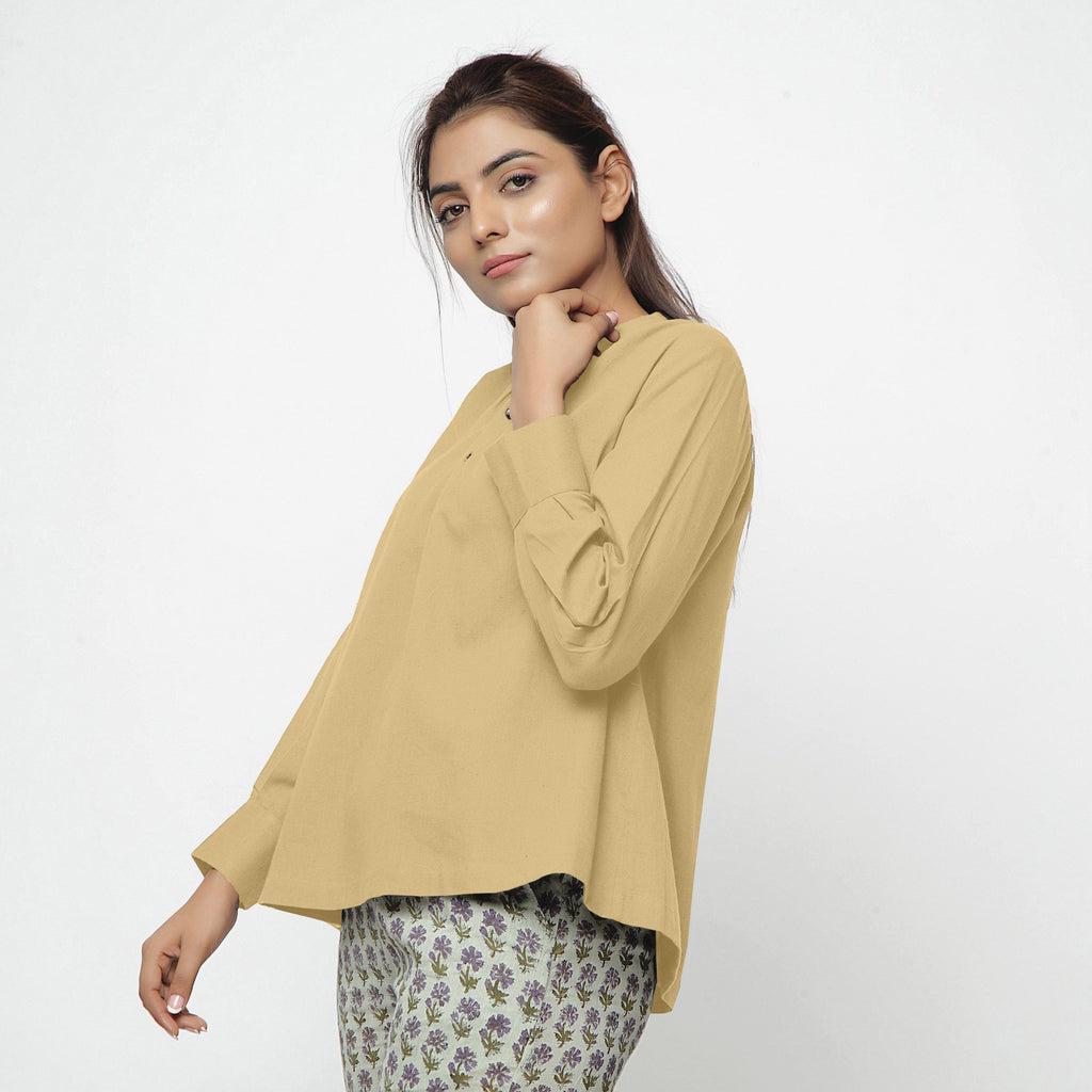 Left View of a Model wearing Light Khaki Cotton Flax Straight Yoked Top