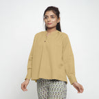 Front View of a Model wearing Light Khaki Cotton Flax Straight Yoked Top