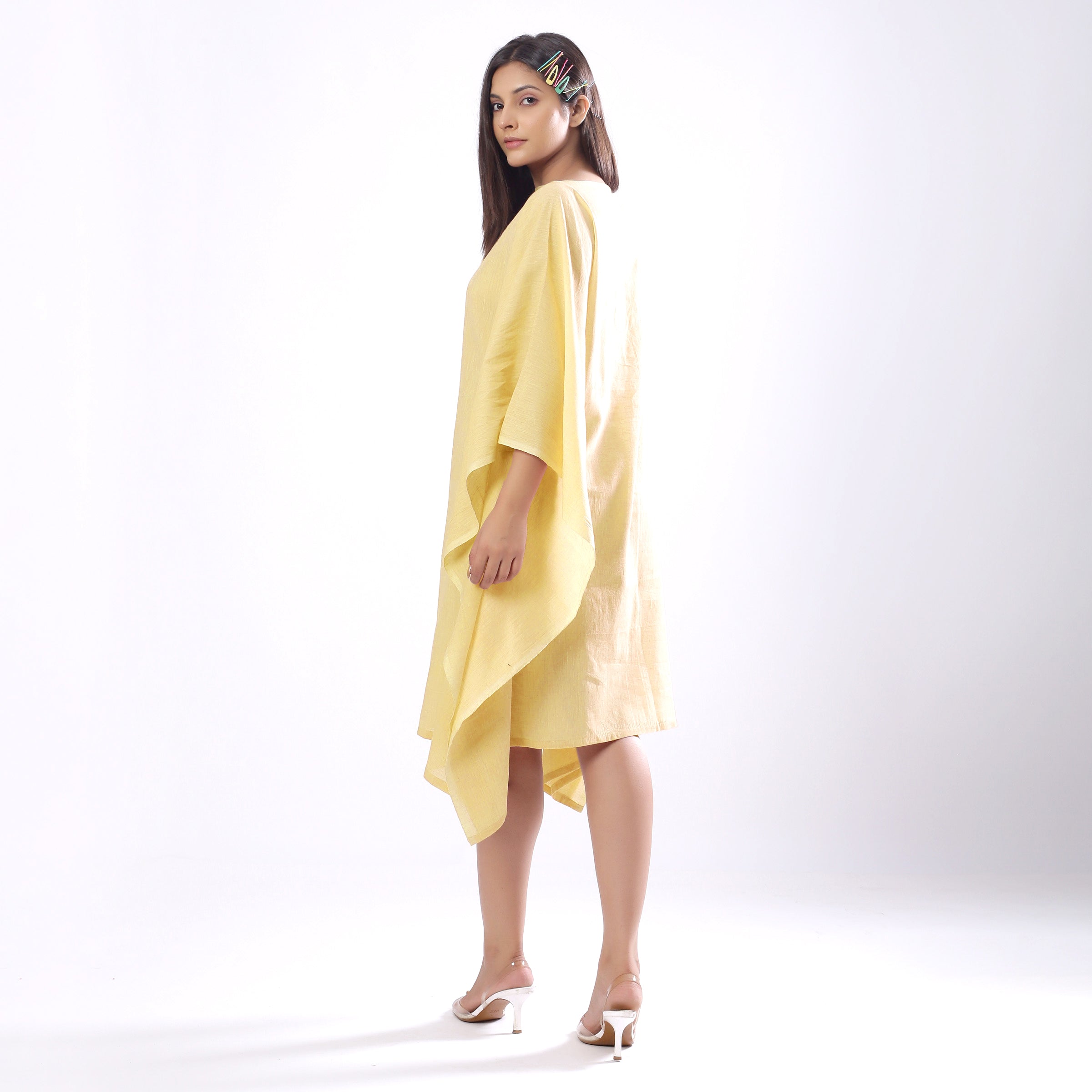 Left View of a Model wearing Light Yellow 100% Cotton Kaftan