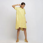 Right View of a Model wearing Light Yellow Tie And Dye High Low Dress