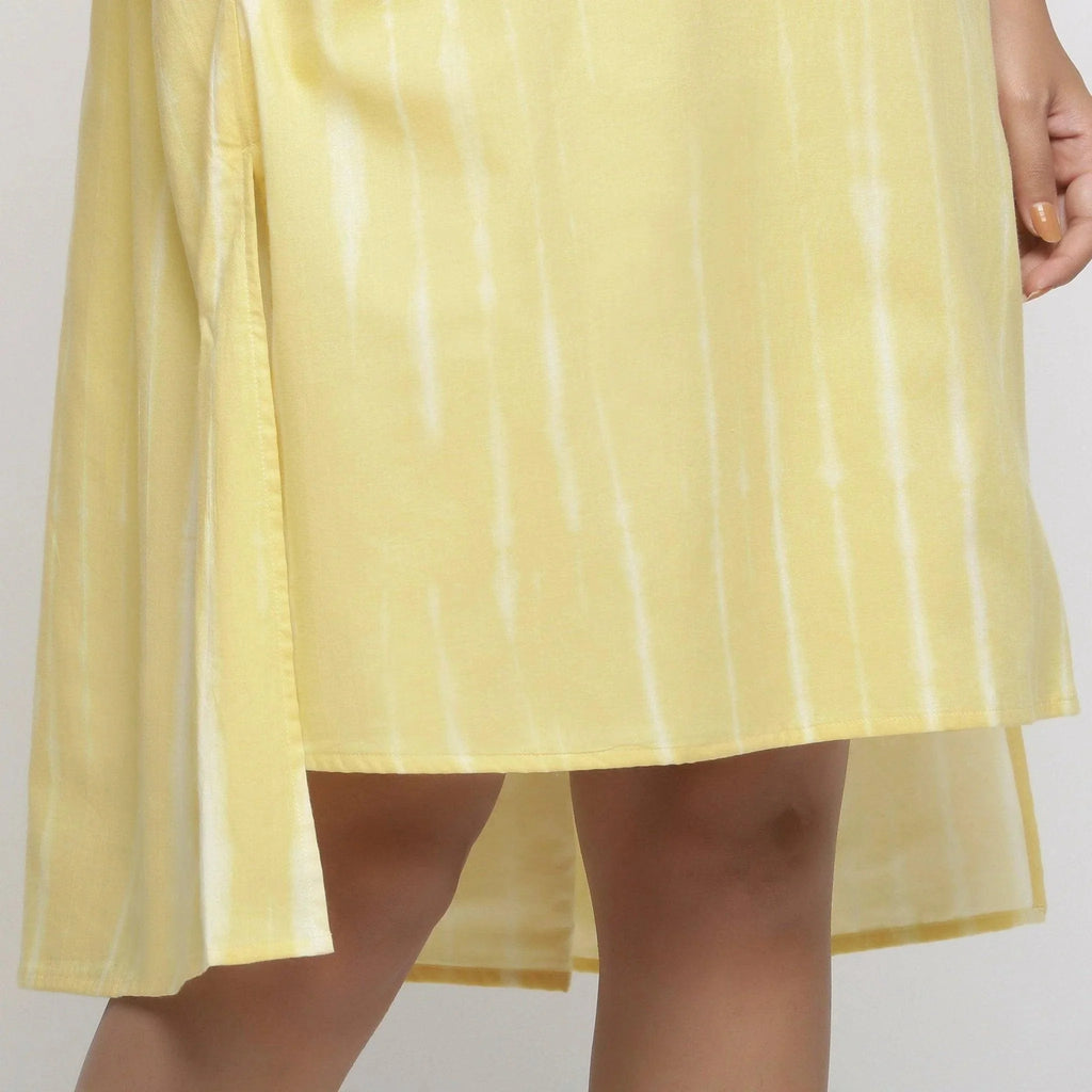 Close View of a Model wearing Light Yellow Tie And Dye High Low Dress