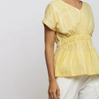 Front Detail of a Model wearing Light Yellow Hand Tie Dye Blouson Top