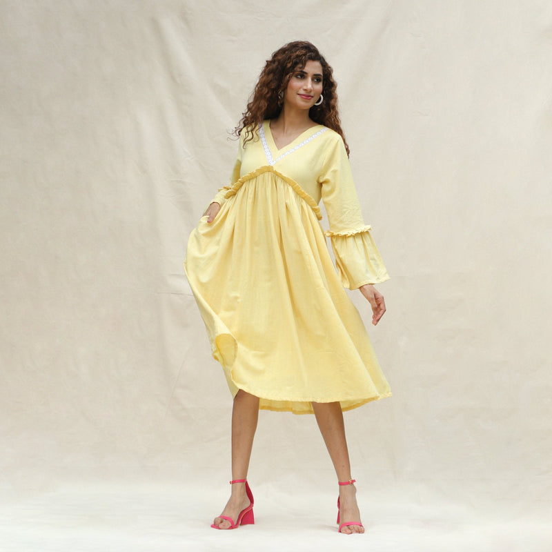 Front View of a Model wearing Light Yellow Handspun Cotton Bohemian Midi Dress