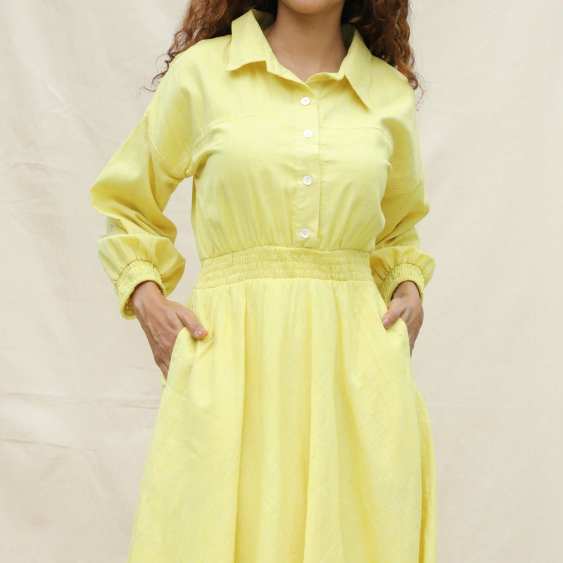 Front Detail of a Model wearing Light Yellow Handspun Cotton Yoked Button-Down Midi Dress