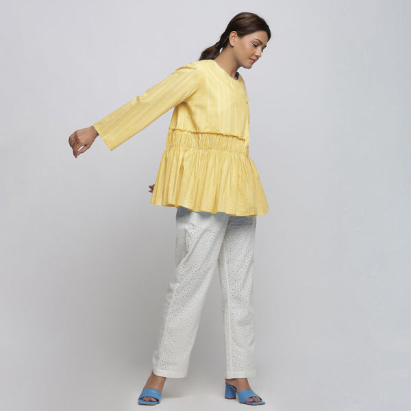 Right View of a Model wearing Light Yellow Tie Dyed Anti-Fit Outerwear