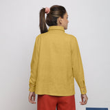 Back View of a Model wearing Light Yellow Vegetable Dyed 100% Cotton Button-Down Shirt