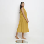 Right View of a Model wearing Light Yellow Vegetable Dyed A-Line Paneled Dress