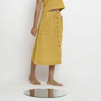 Right View of a Model wearing Light Yellow Vegetable Dyed Button-Down Skirt
