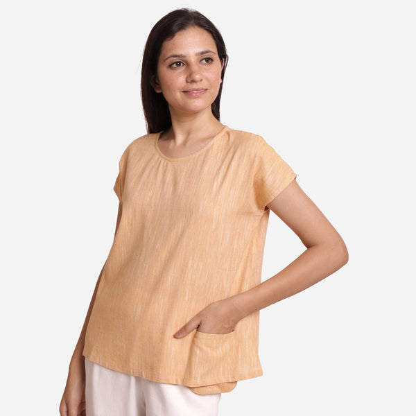 Right View of a Model wearing Light Yellow Boat-Neck Anti-Cling Top