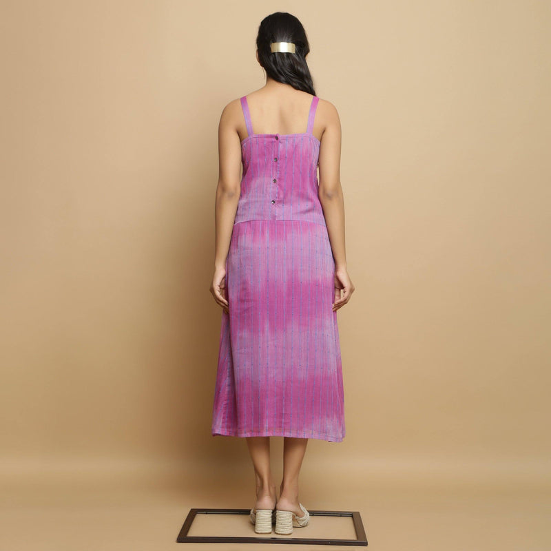 Back View of a Model wearing Lilac Cotton Strappy Godet Dress