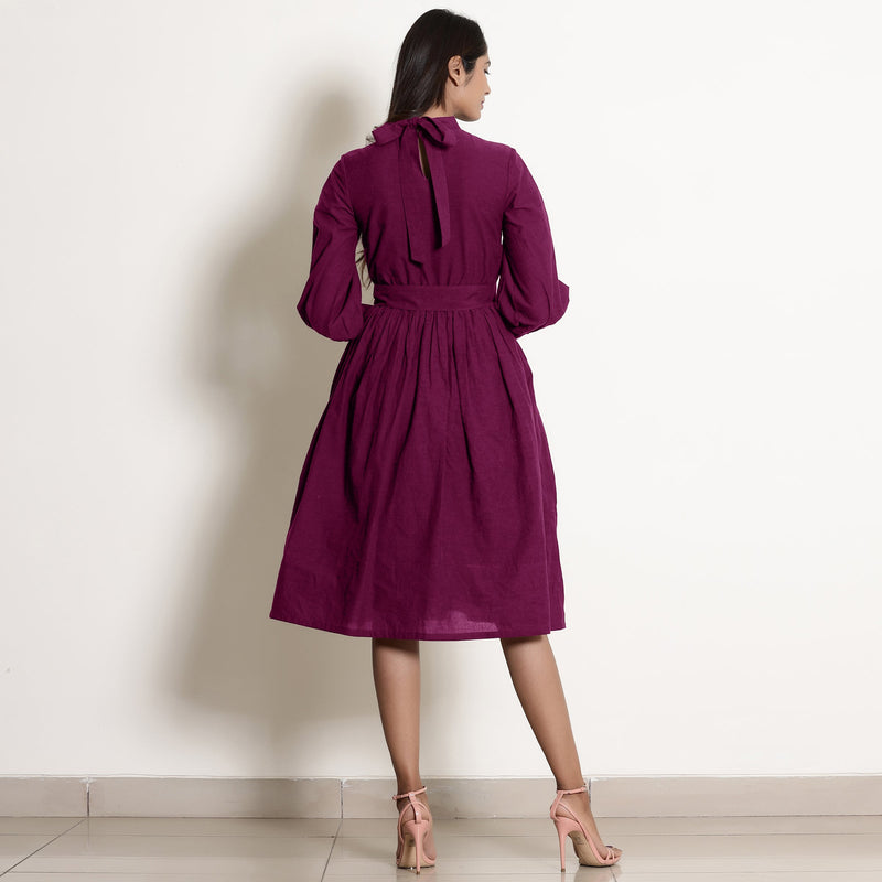 Back View of a Model wearing Magenta Fit and Flare Dress