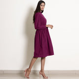 Right View of a Model wearing Magenta Fit and Flare Dress