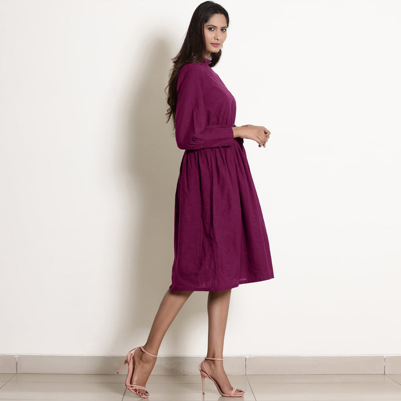 Right View of a Model wearing Magenta Fit and Flare Dress