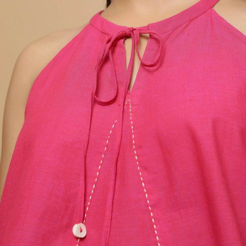 Front Detail of a Model wearing Magenta Hand-Embroidered Flared Top