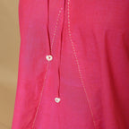 Front Detail of a Model wearing Magenta Hand-Embroidered Flared Top