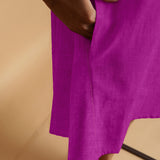 Close View of a Model wearing Magenta Linen Embroidered Knee-Length Godet Dress