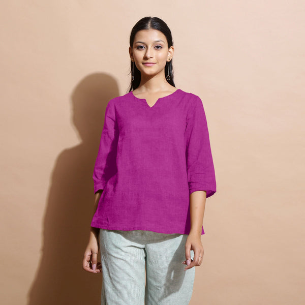 Front View of a Model wearing Magenta 100% Linen Split-Neck Tunic Top