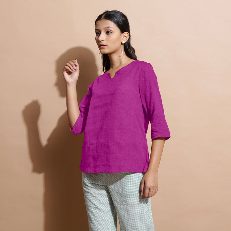 Left View of a Model wearing Magenta 100% Linen Split-Neck Tunic Top