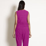 Back View of a Model wearing Magenta 100% Linen V-Neck Frilled Godet Top