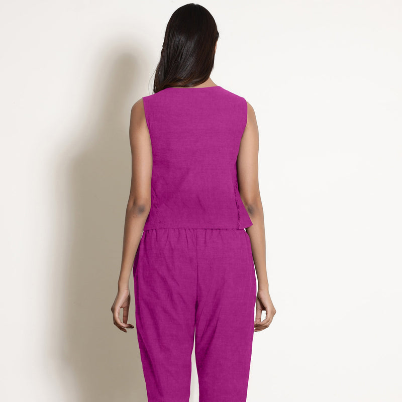 Back View of a Model wearing Magenta 100% Linen V-Neck Frilled Godet Top