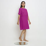 Right View of a Model wearing Magenta Linen Knee Length Shift Yoked Dress