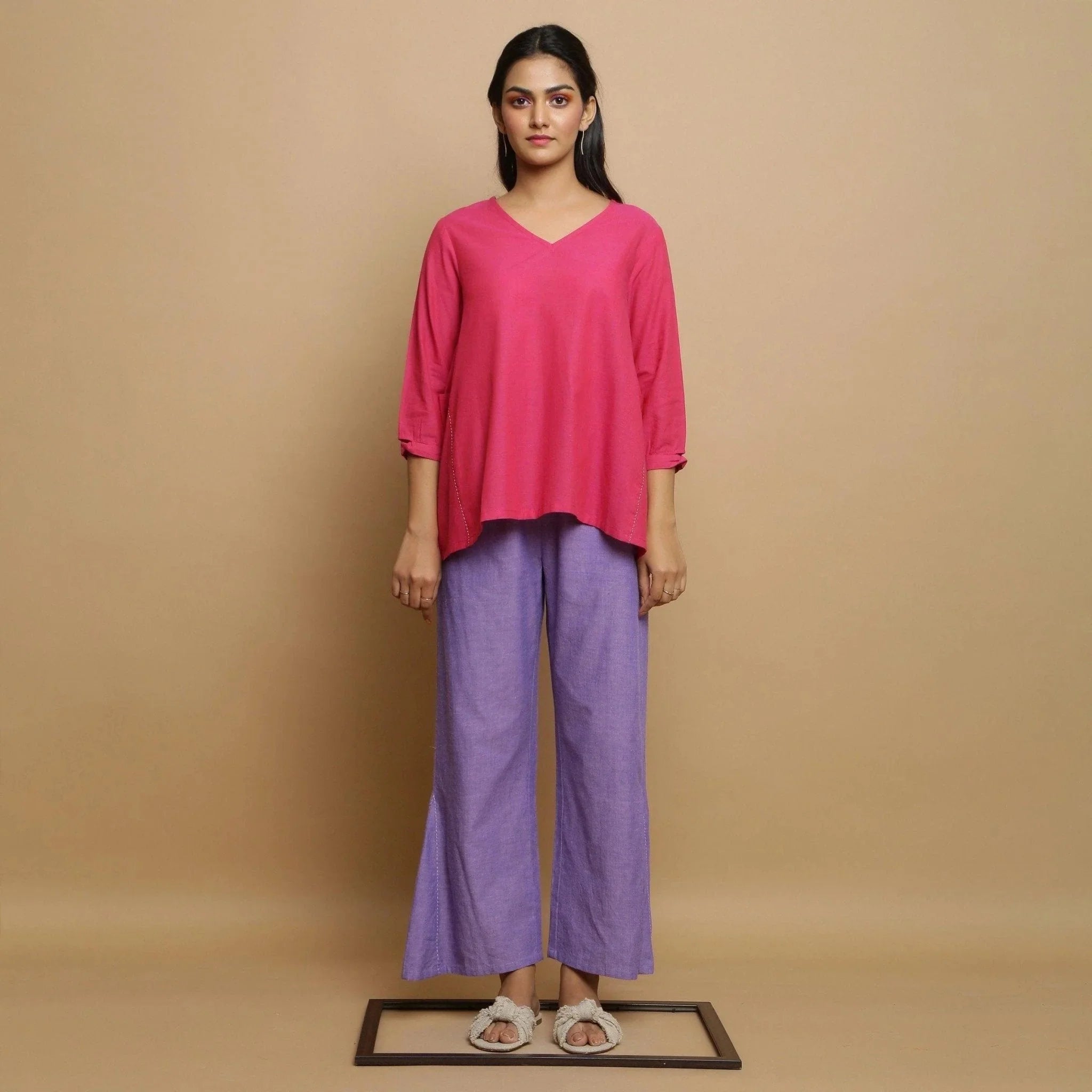 Front View of a Model wearing Magenta Mangalgiri Cotton Flared Top