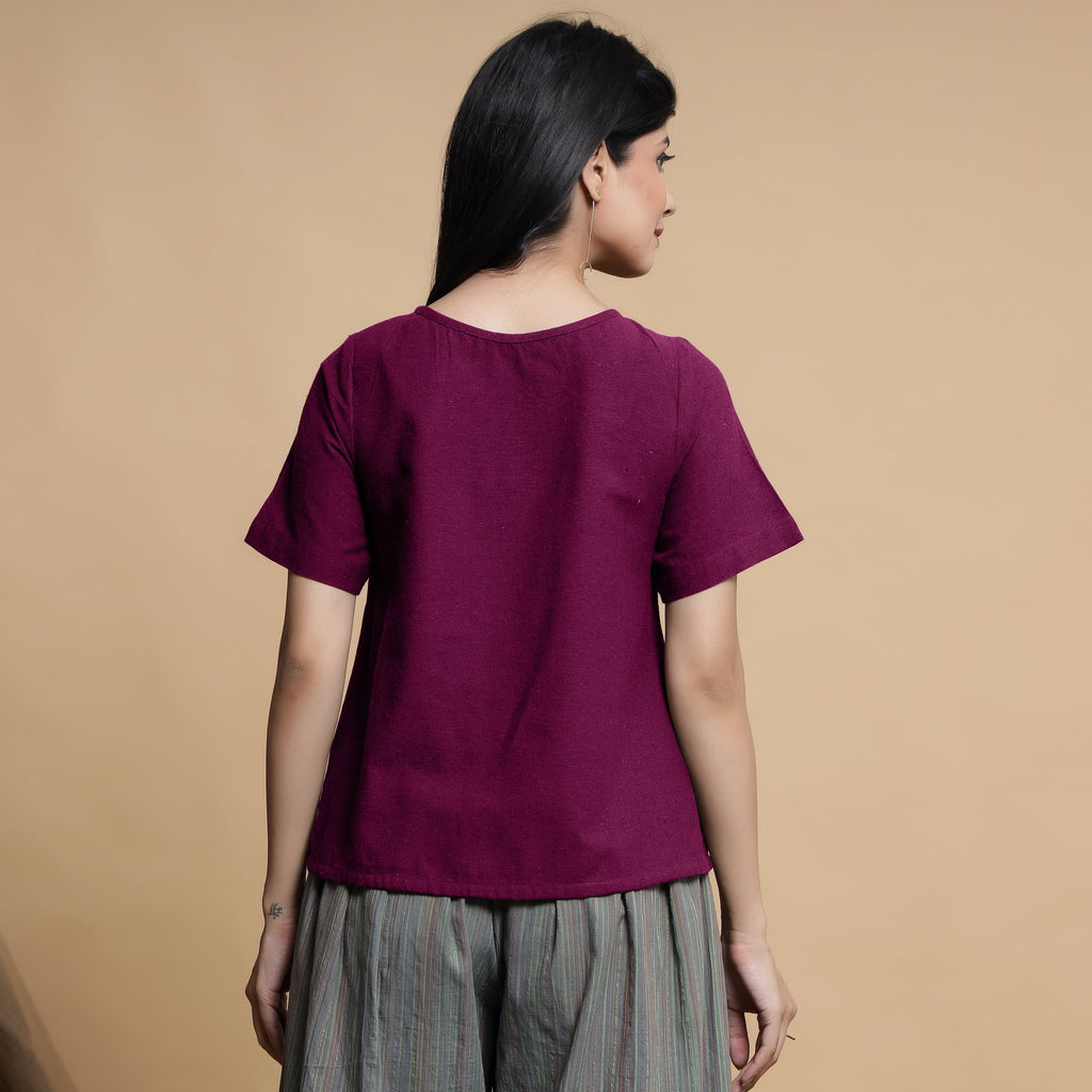 Back View of a Model wearing Magenta Pleated Neck A-Line Top