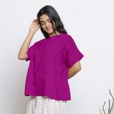 Left View of a Model wearing Magenta Round Neck Linen Loose Gathered Yoke Top