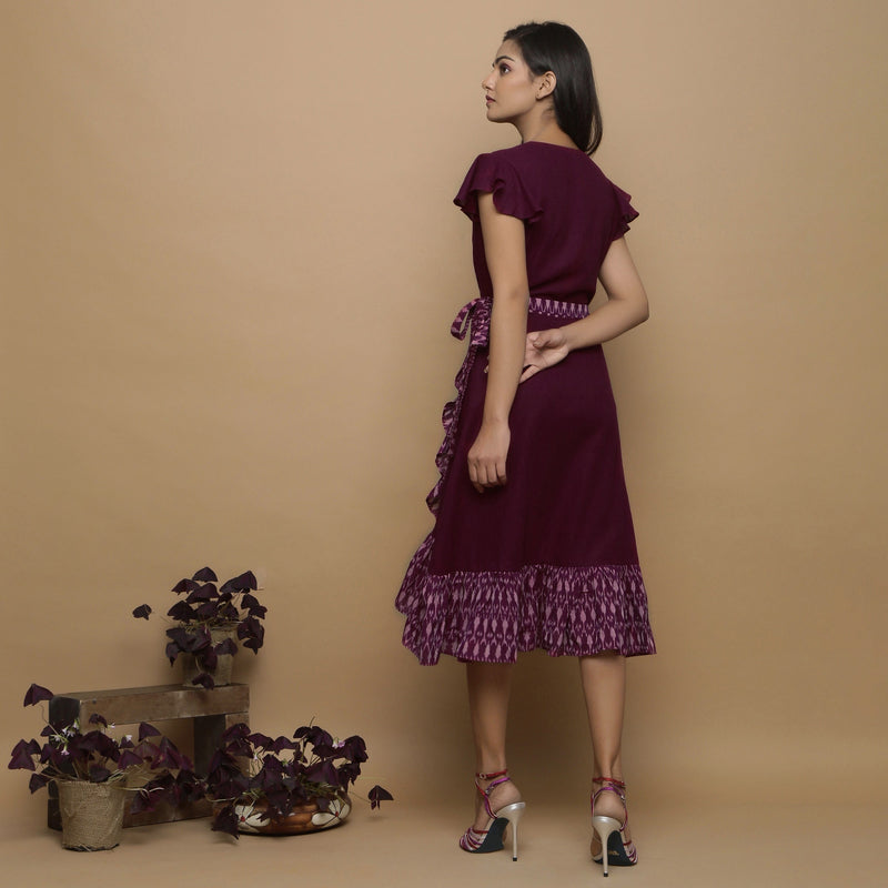 Back View of a Model wearing Maroon Handspun Cotton Asymmetrical Midi Wrap Dress