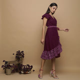 Right View of a Model wearing Maroon Handspun Cotton Asymmetrical Midi Wrap Dress