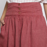 Front Detail of a Model wearing Maroon Handspun Flared High-Rise Pant