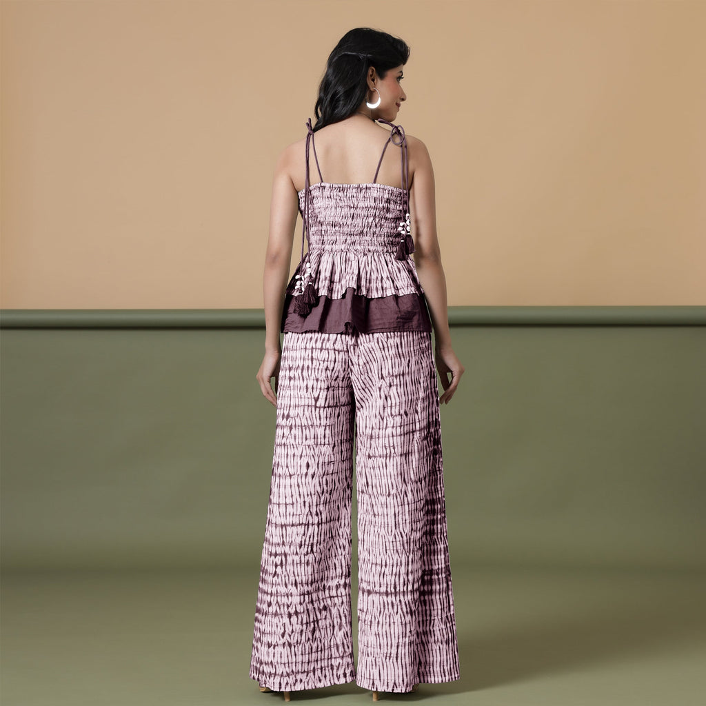 Back View of a Model wearing Maroon Shibori 100% Cotton Paperbag Pant