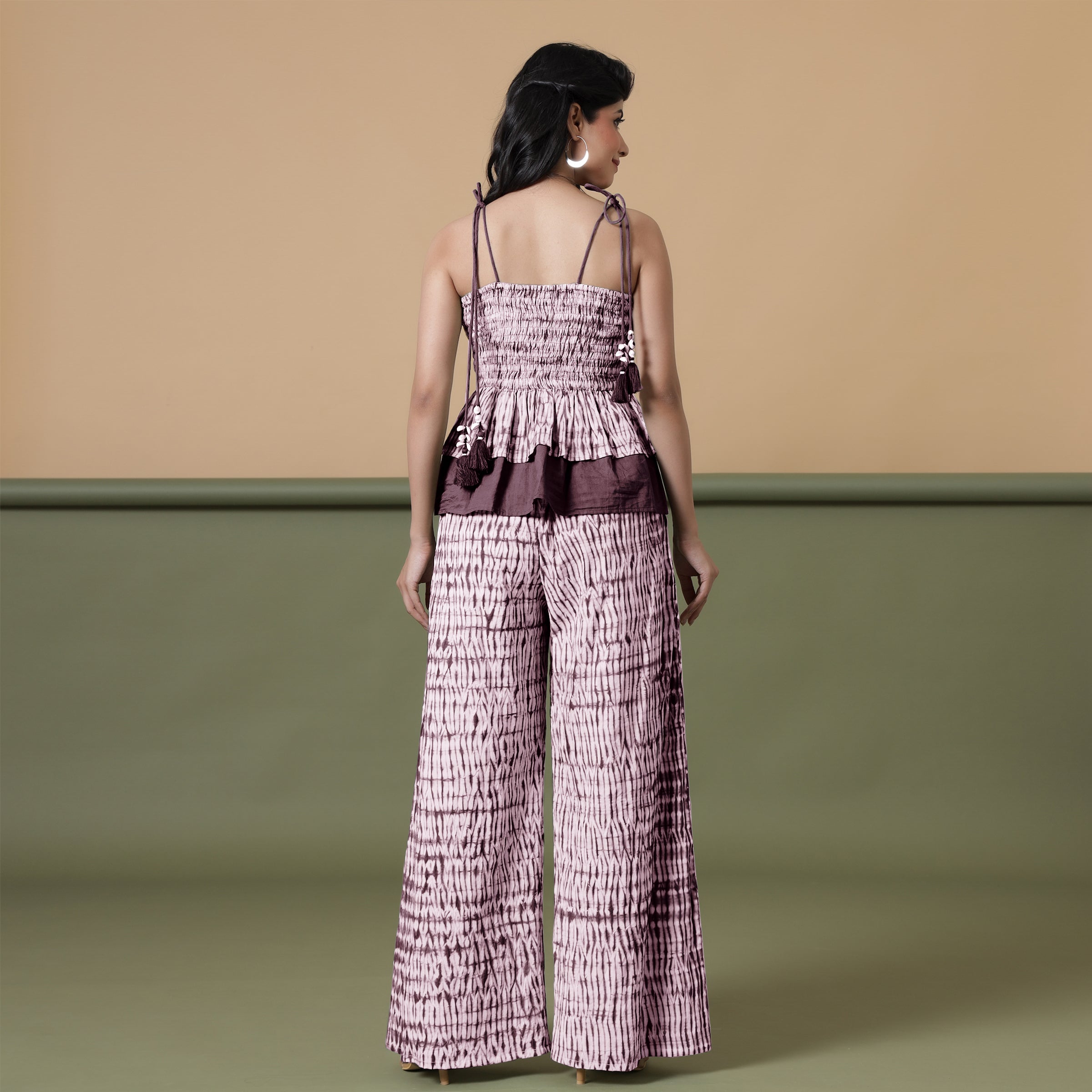 Back View of a Model wearing Maroon Shibori 100% Cotton Paperbag Pant