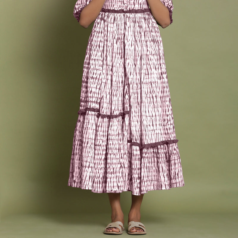 Front Detail of a Model wearing Maroon Shibori Asymmetrical Tier Maxi Dress