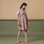 Right View of a Model wearing Maroon Shibori Drop Shoulder Dress