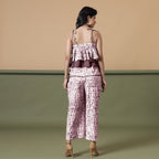 Back View of a Model wearing Maroon Shibori Frilled Camisole Jumpsuit