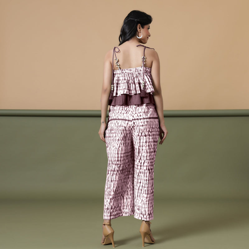 Back View of a Model wearing Maroon Shibori Frilled Camisole Jumpsuit