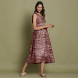 Right View of a Model wearing Maroon Shibori One-Shoulder Midi Dress