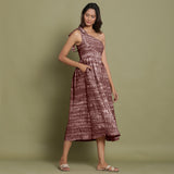 Right View of a Model wearing Maroon Shibori One-Shoulder Midi Dress